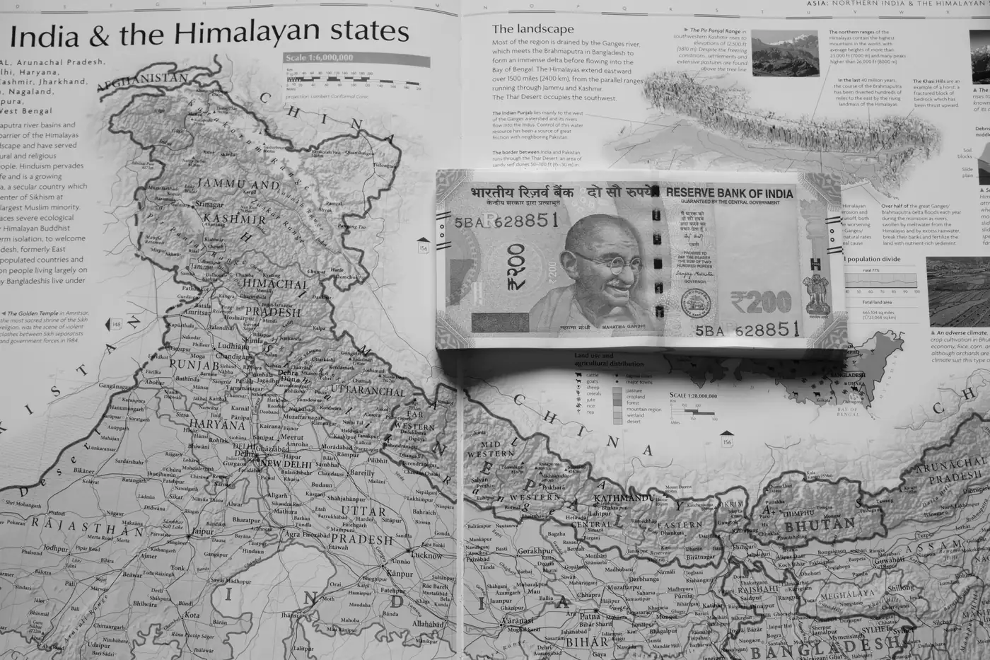 ₹200 note lying on a printed map of northern India